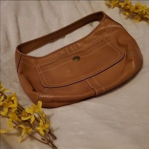 Beautiful authentic coach bag offers welcome